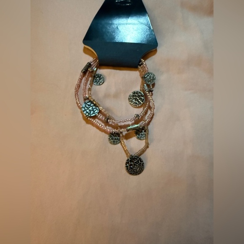 Elegant Multi-Strand Pink and Gold Bracelet